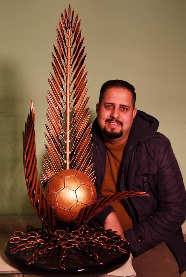 عمل فني بعنوان (رفع الحظر عن الملاعب العراقية) للفنان حسين الكرعاوي